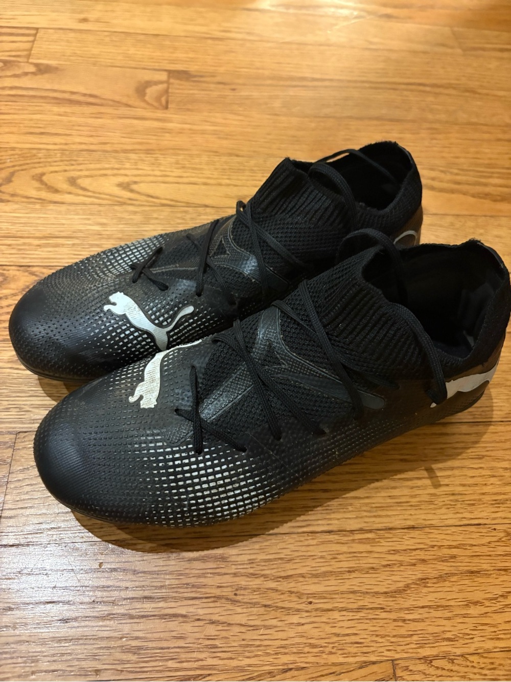 Puma Kid’s Black Athletic Soccer Shoes with Silver Accents